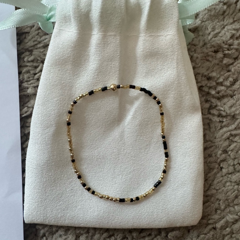 Elegant Gold and Black Beaded Bracelet